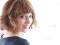 ロマンチックなパーマスタイルでドーリーヘアー