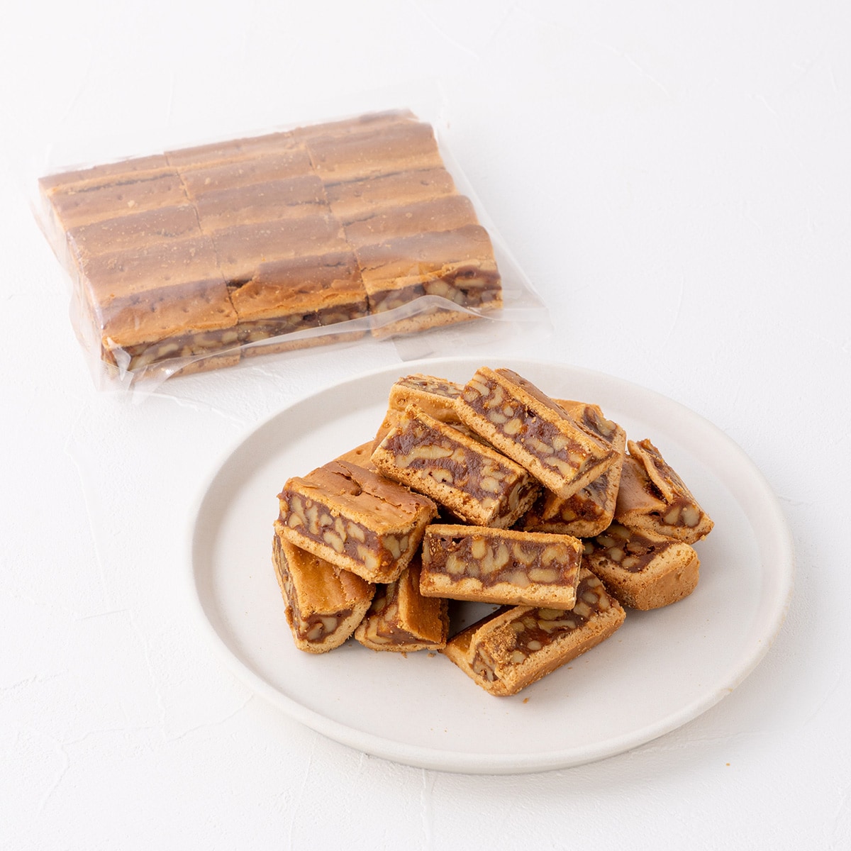 「クルミッ子 切り落とし」は270gに増量