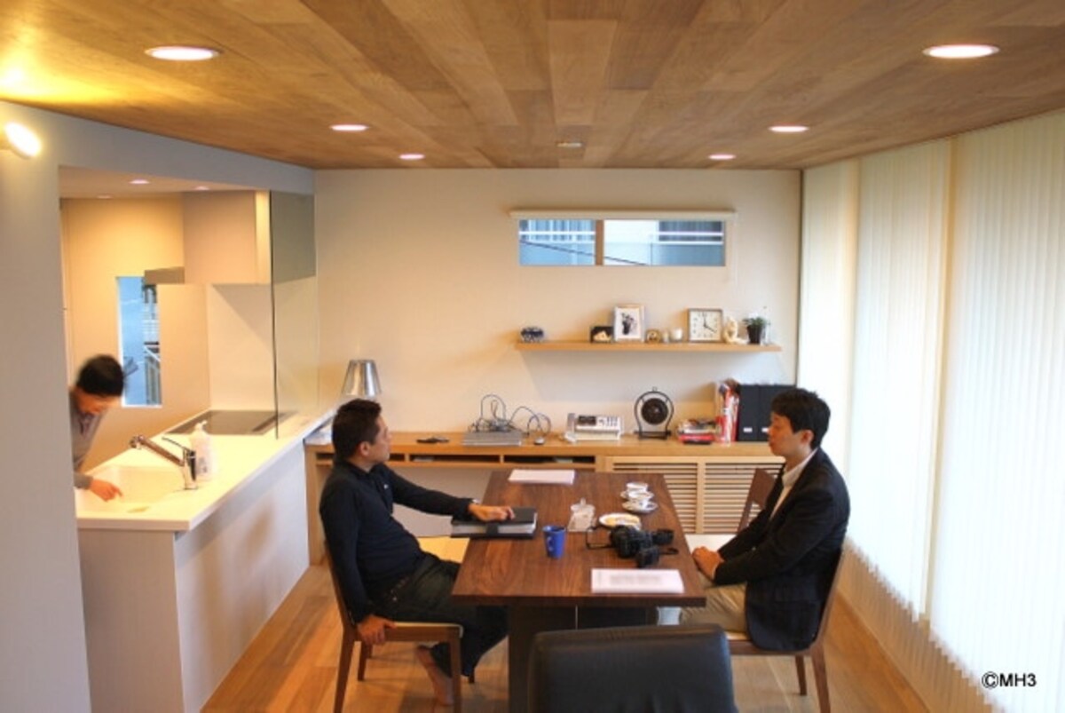 オーナー（S氏）と各務さん（右）
