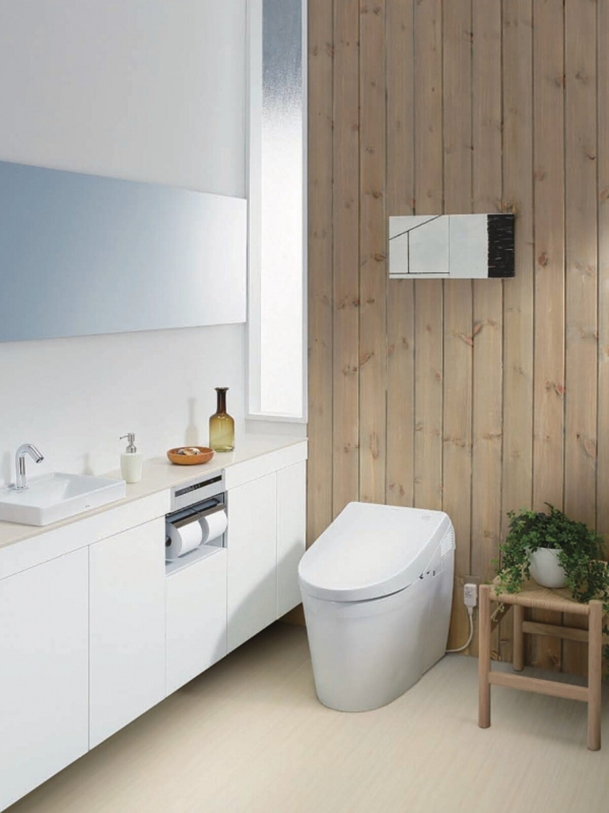 トイレ機器の性能は進化し、デザイン性もアップ。快適なトイレ空間プランが多くみられるようになってきた。[ネオレストAHW(レストルームドレッサーシステムシリーズ専用品)] TOTO　http://www.toto.co.jp/
