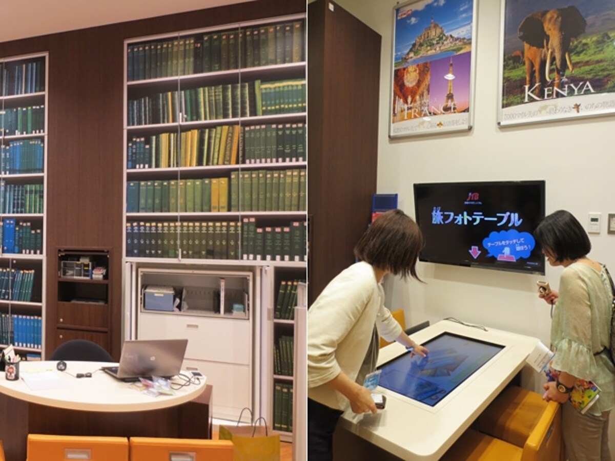 JTBは、3世代ファミリーの来店に対応する、解放感あふれるカウンターが特徴。タッチすると情報が流れる「旅フォトテーブル」も設置