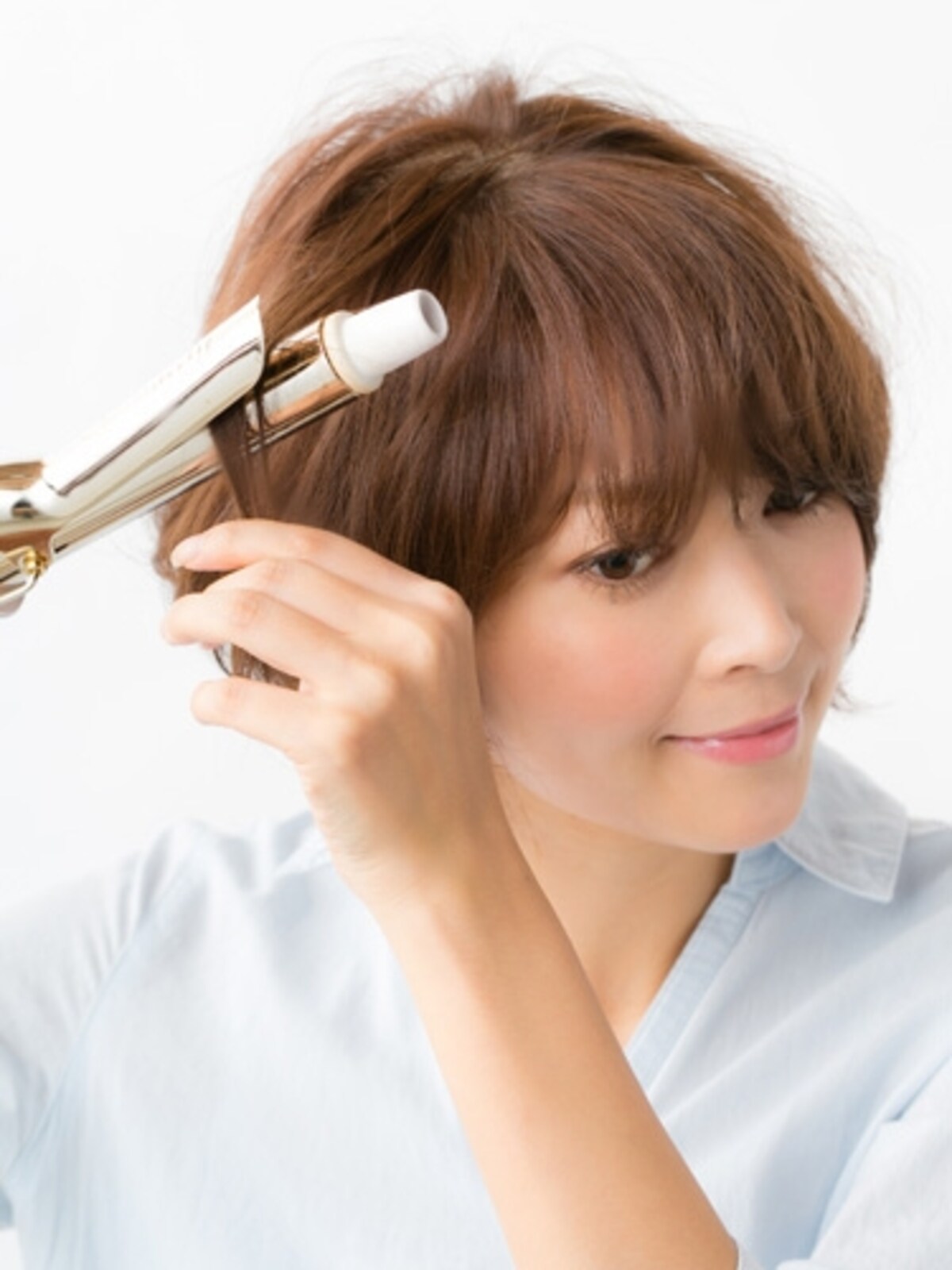 毛先のみコテで巻く