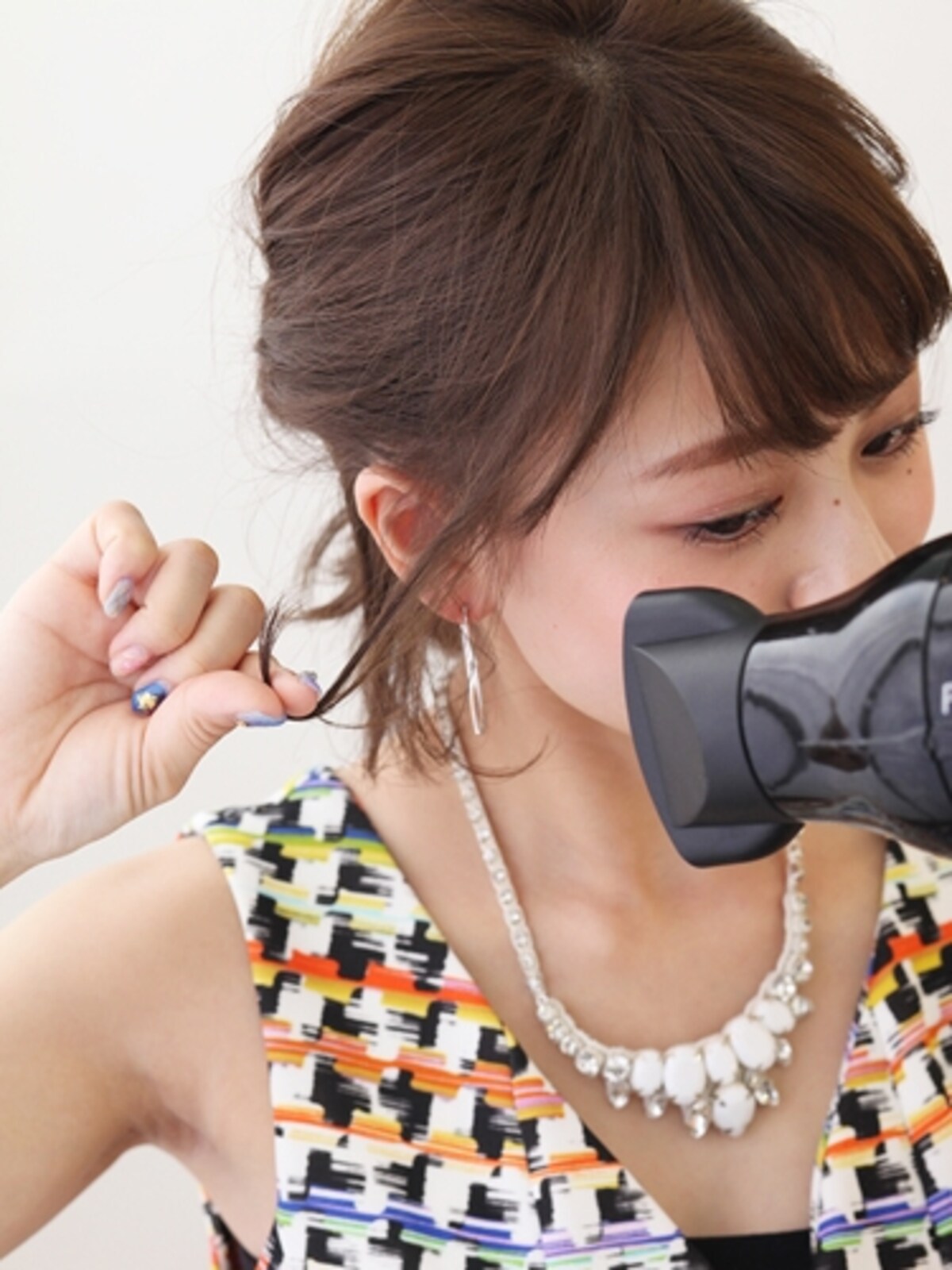 ドライヤーで乾かし、毛先にクセをつける