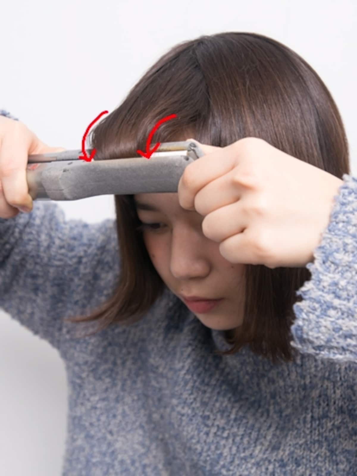 引き出した毛に平行にはさむ