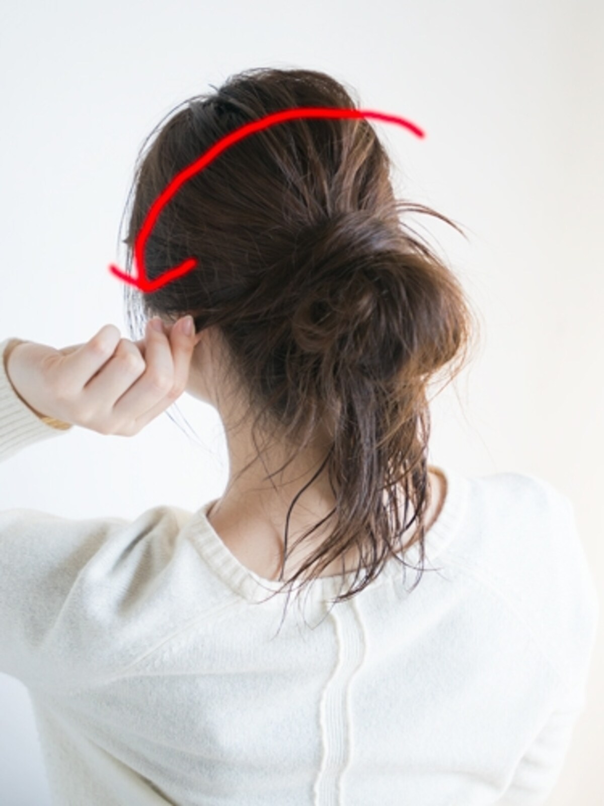 結び目を隠すように巻きつける