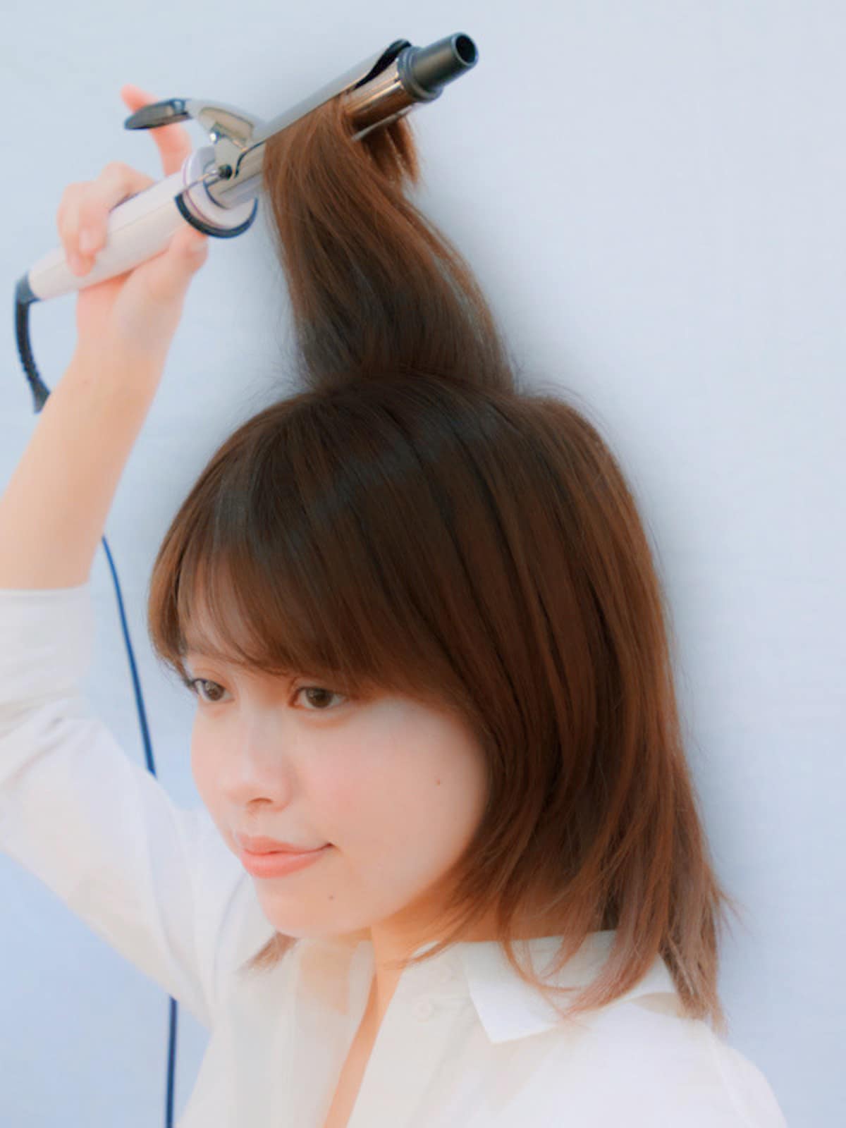 真上に持ち上げて巻くことでふんわり仕上がる