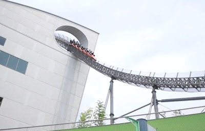 Ride a Roller Coaster through a Building