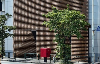 Tokyo Building Shaded by Hinoki Wood Curtain