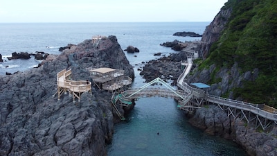 The Clear Water, Black Stone, and Dark Skies of Kozushima
