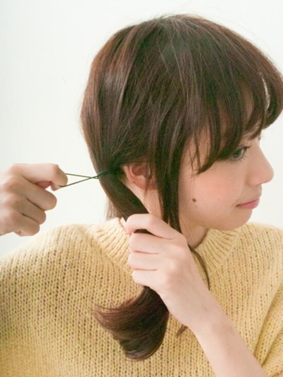 根元から浮かないようにキツく結ぶ