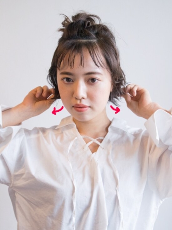 指先でつまみながら引き出す