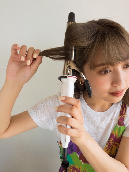表面の髪は根元から巻く