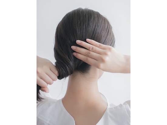 上に向かって1回転ねじる