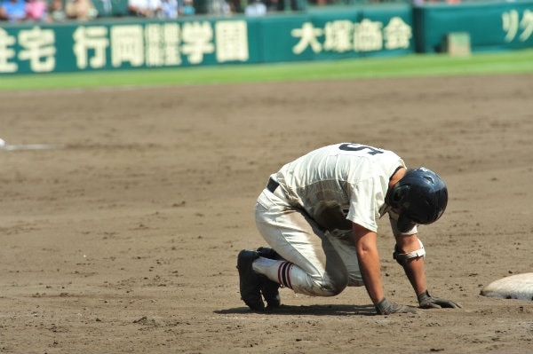 8. High school baseball players bring dirt home