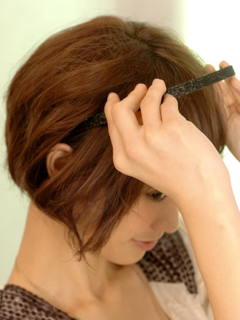 耳の後ろにつける