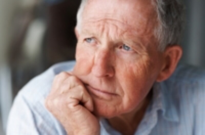 A senior man contemplating