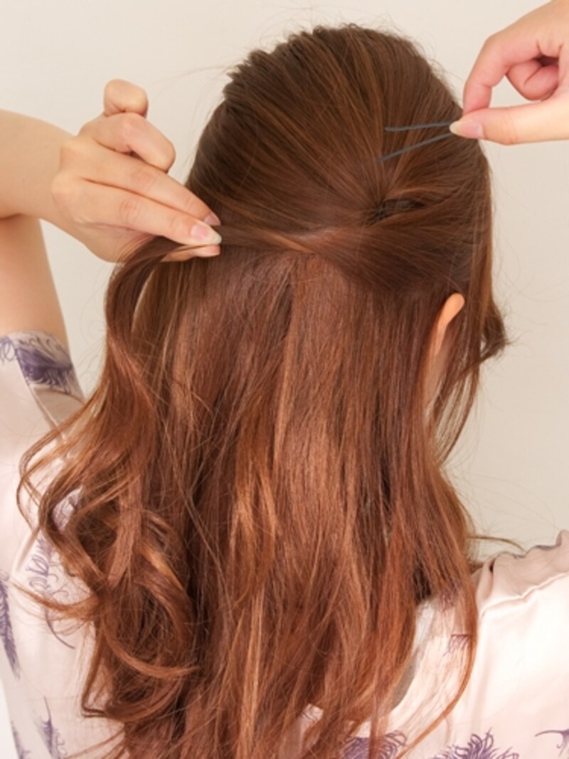 ポンパを大きくするイメージで毛束を足していく