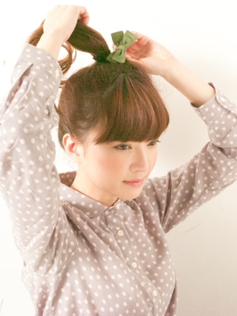 飾りがみえる位置にくるように