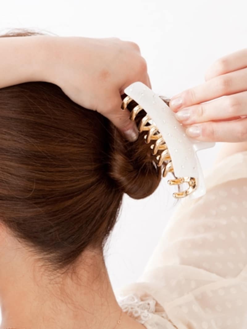 大きくクリップを開いて留める