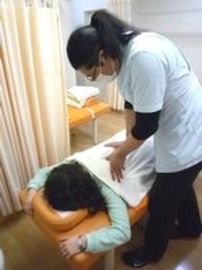背中の調整