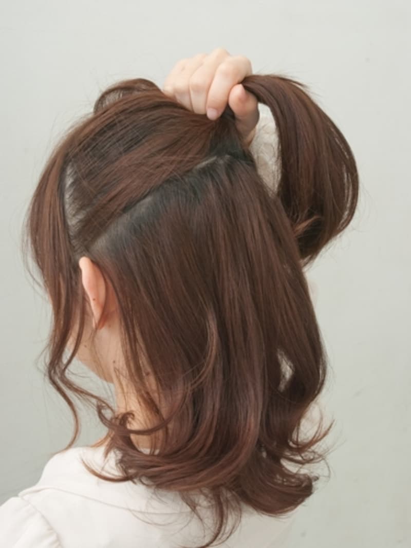 根元から浮かないようにキツく結ぶ