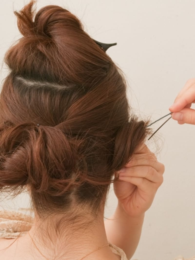 ピンで止めたあと全体のボリュームを整える