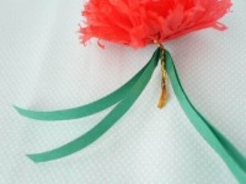 ワイヤーで紙テープを結ぶ