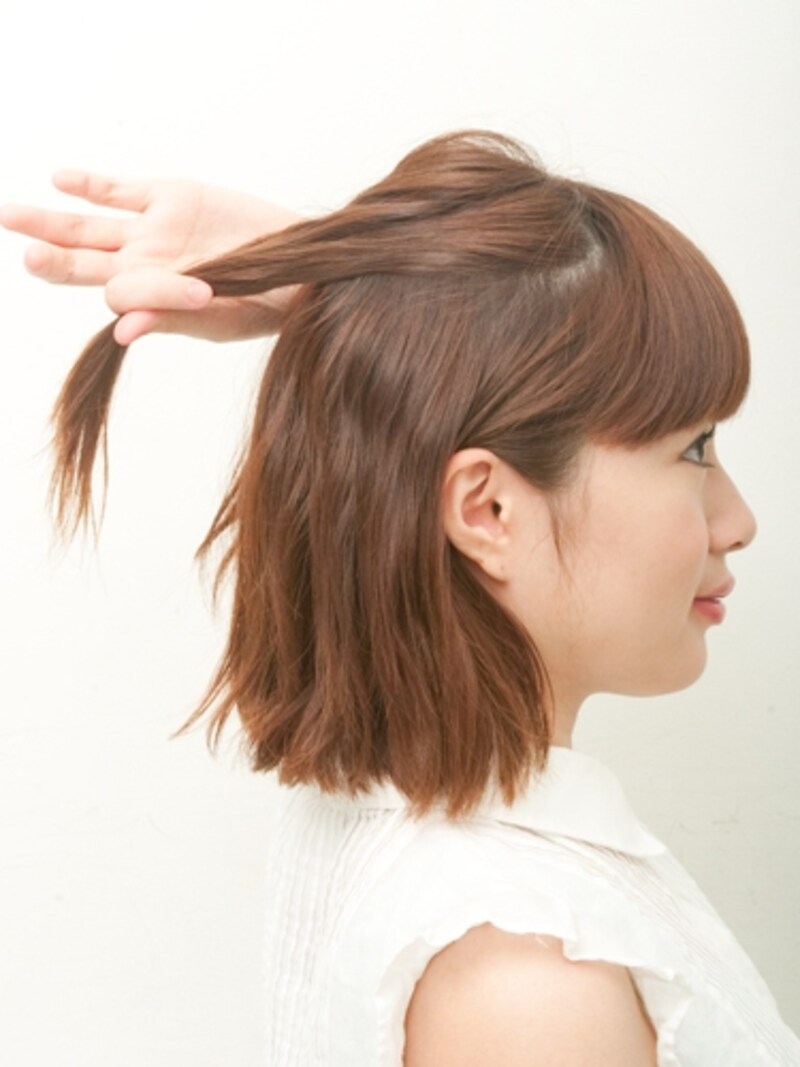 後ろに向かってひっぱるとねじりやすい