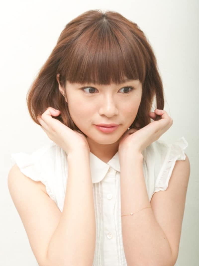 ワックスムースをもみ込んでクセを出す