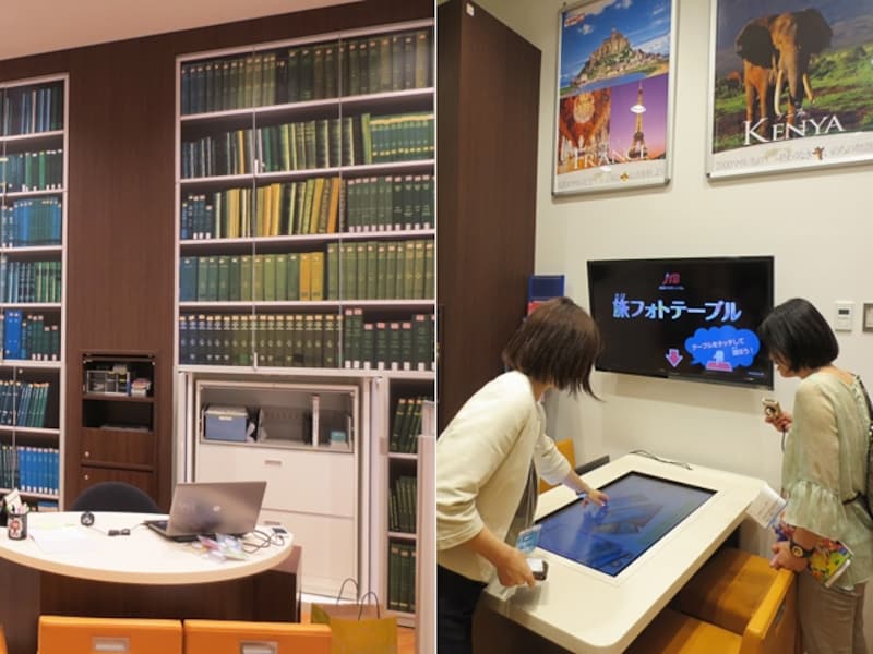 JTBは、3世代ファミリーの来店に対応する、解放感あふれるカウンターが特徴。タッチすると情報が流れる「旅フォトテーブル」も設置