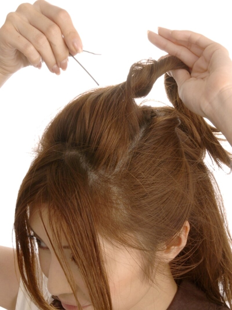 高さが出るようにねじりあげる