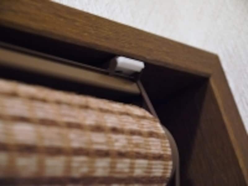 ロールスクリーン／解除ボタン