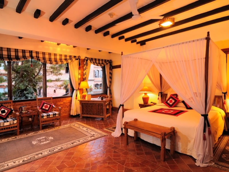 山岳リゾートらしい暖かみある内装のヘリテージ・エクスクルーシブ・スイート