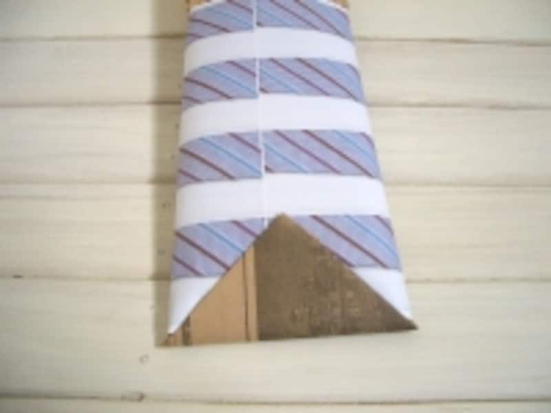 上に折り返して固定