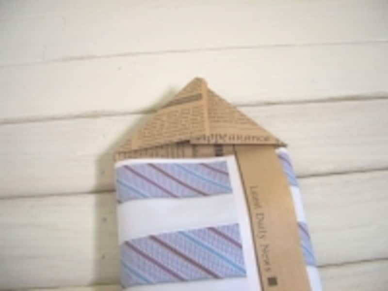 上の角も同じように折る