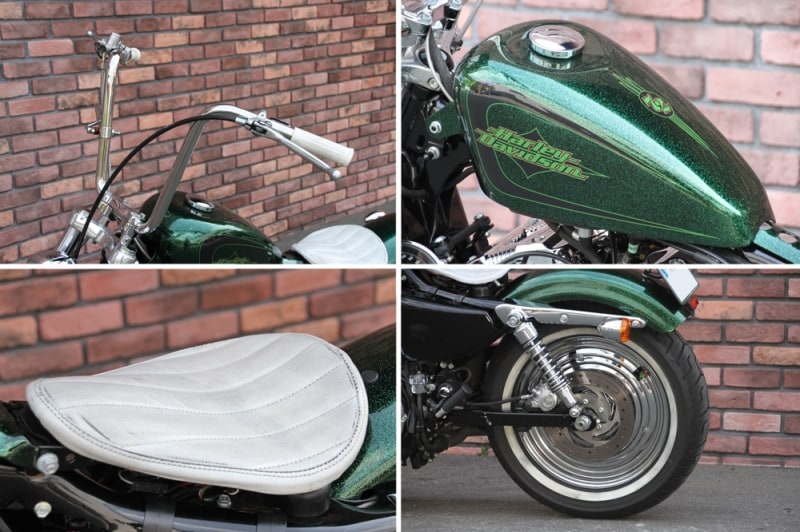 うずたかく上げられたエイプバー、ピーナッツタンク、真っ白なサドルシート、ギラっと輝くディスク入りホイール。