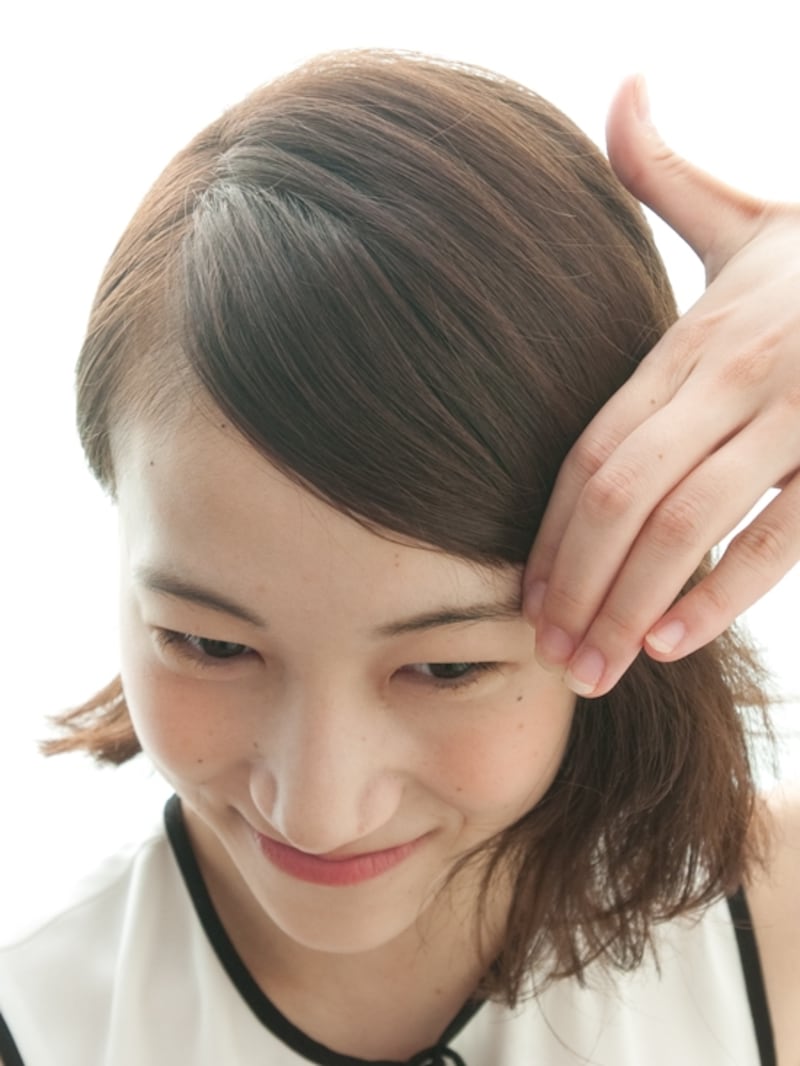 ゆるいカーブを描きタイトにおさえる