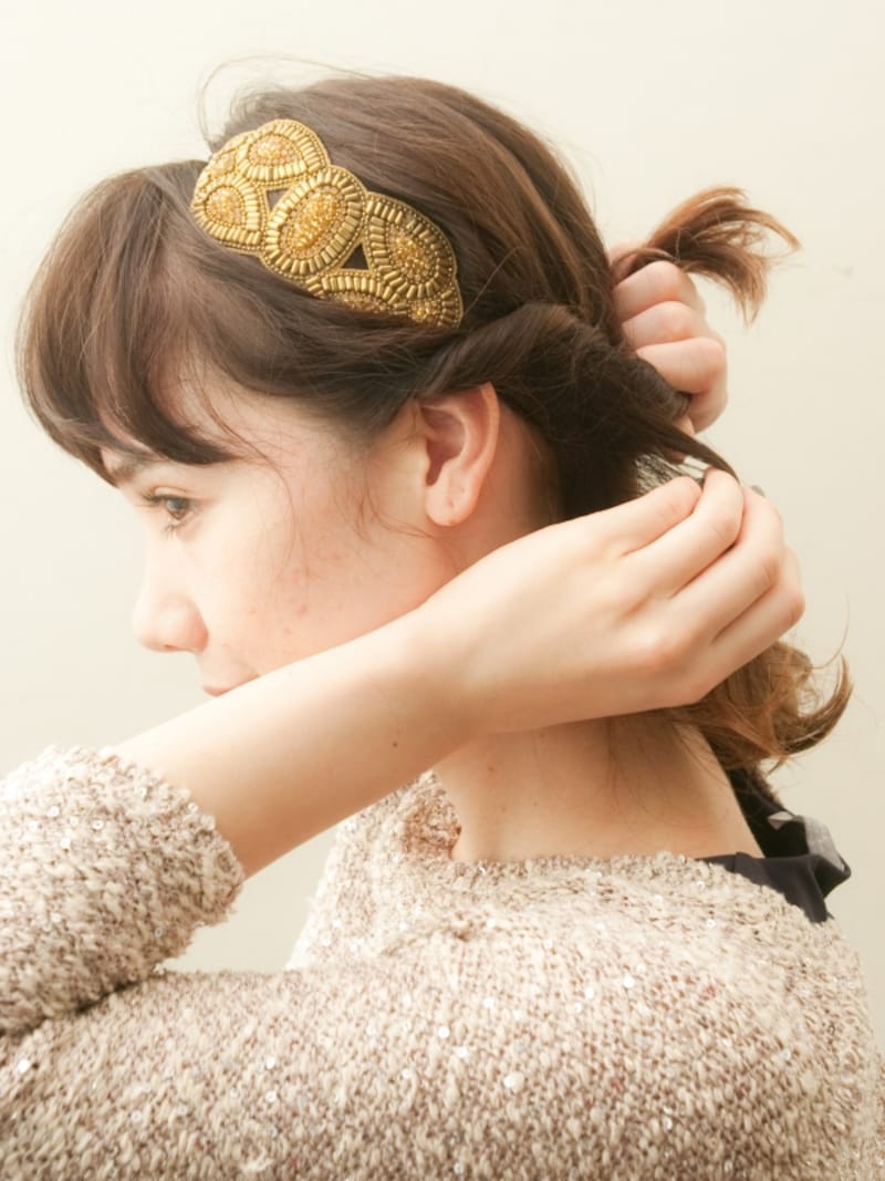 後ろに向かってねじる