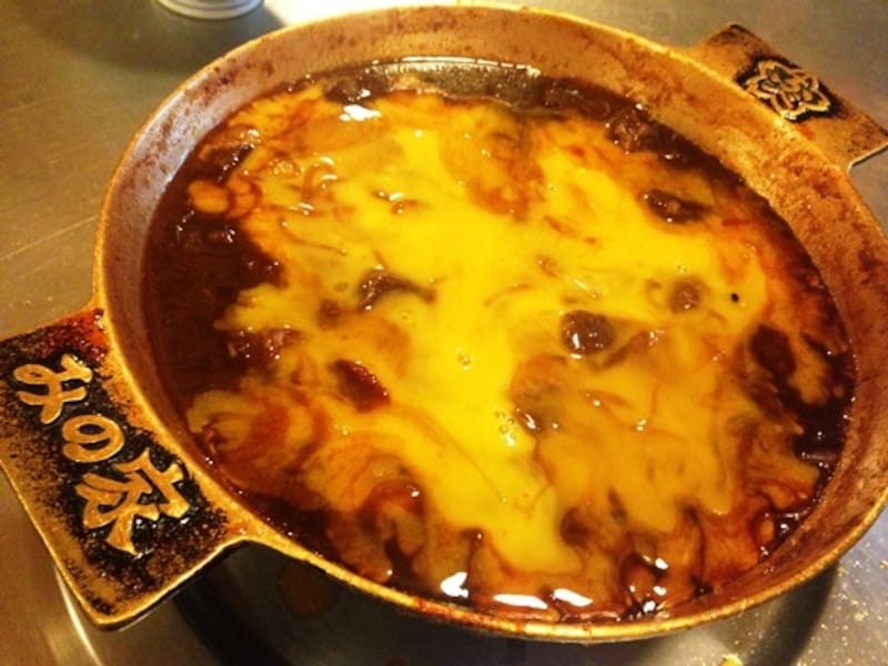 残った溶き卵を鍋の中に