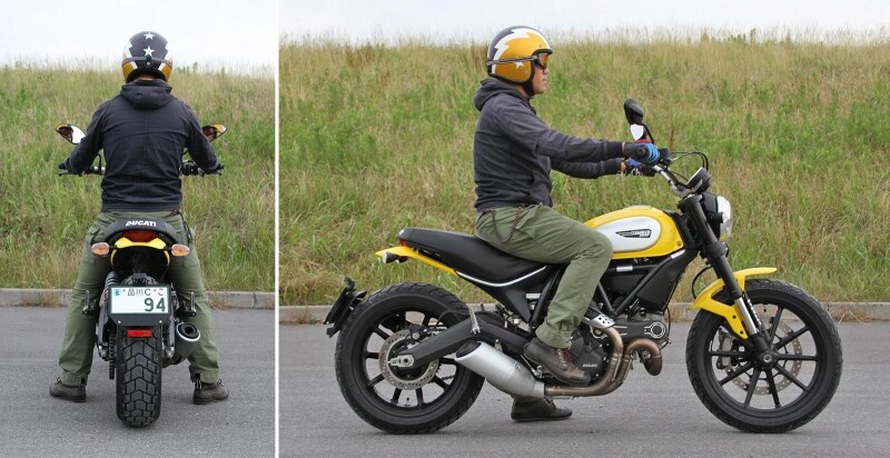 身長174cmのライダーがまたがった際の足着き。両足がべったりと地面に着く