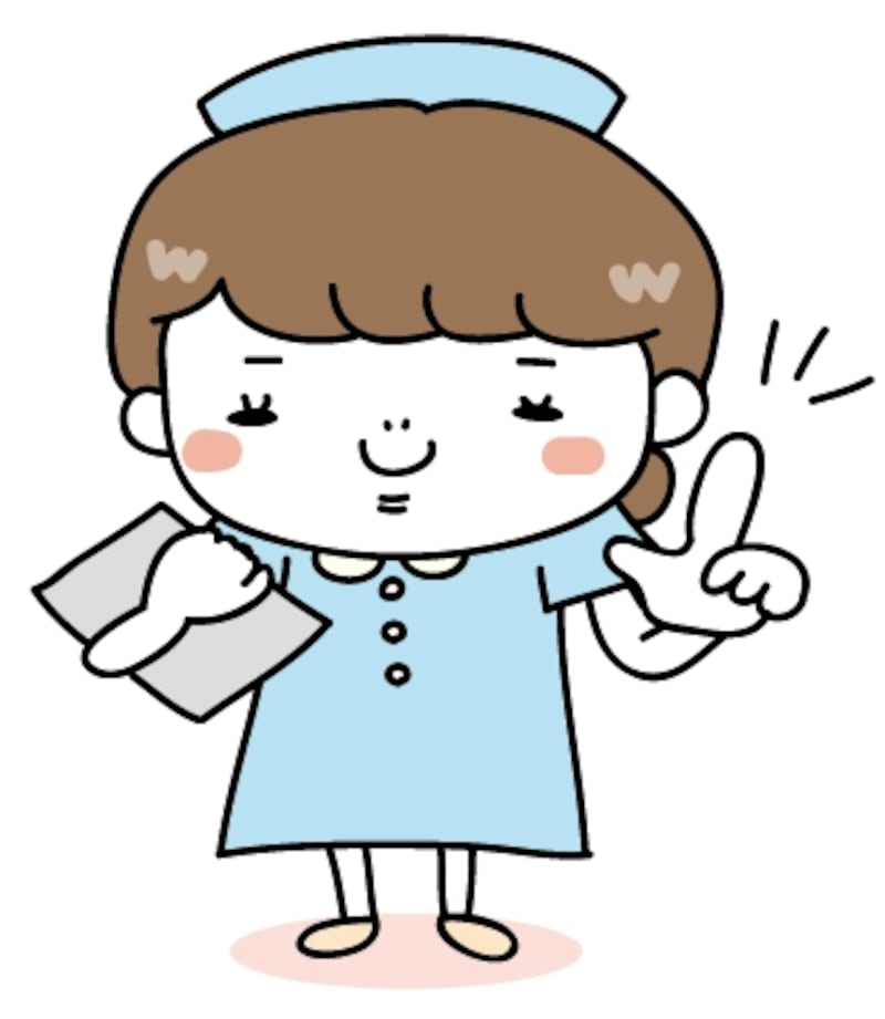 【カラー】アドバイスをするナースの全身カットです。