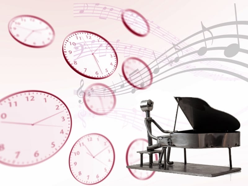 時計と音符の写真