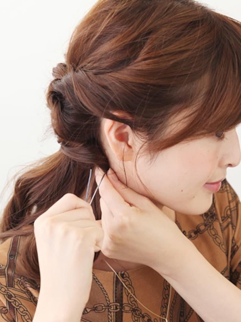 ピンで留めている最中にできるほどよい緩みを活かして