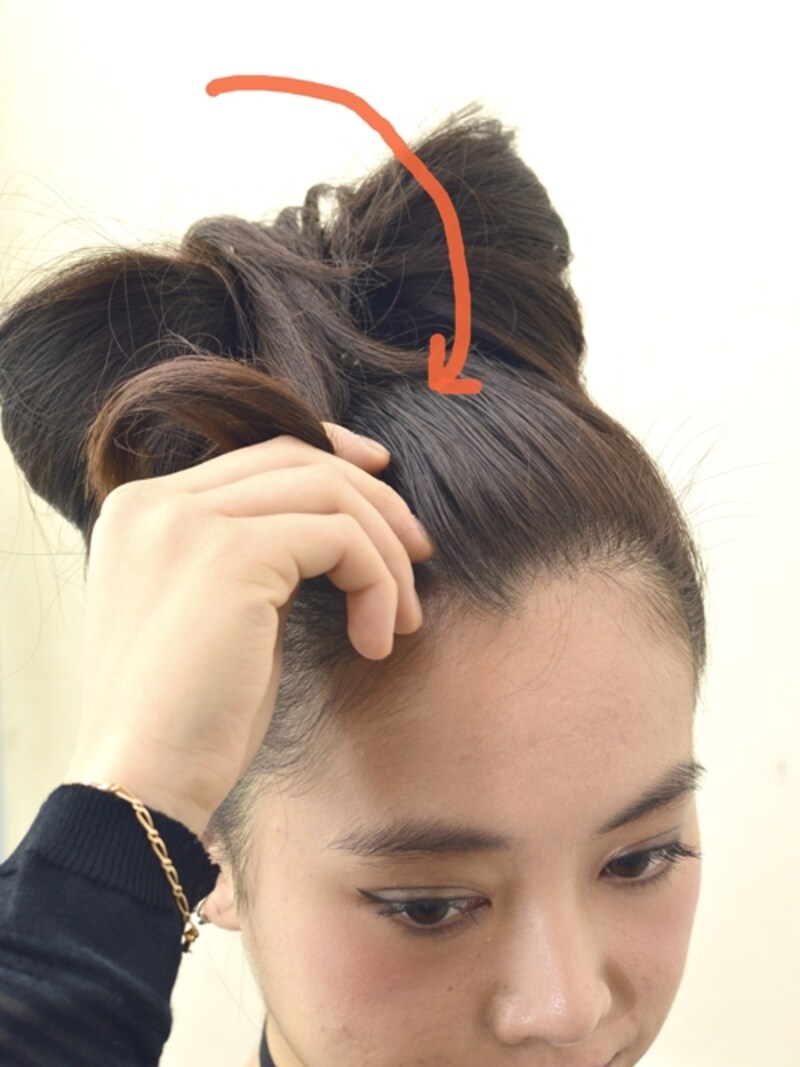 前に倒す