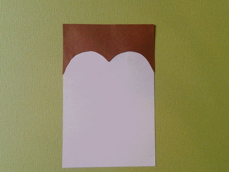 ハガキに合わせて頭部分を貼る