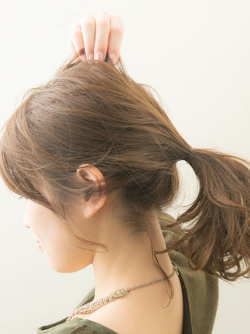 指先でつまみながら引き出す