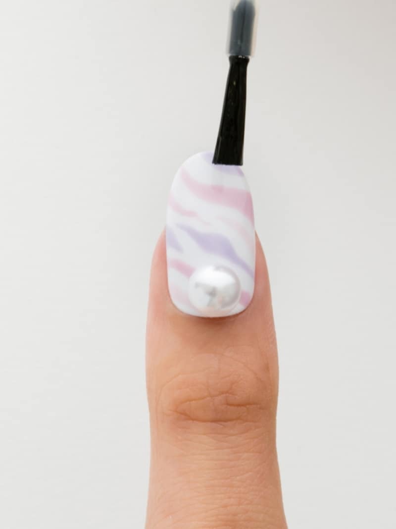 トップコートを重ねる