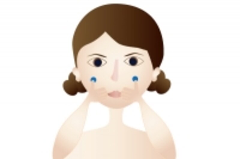 頬を押す