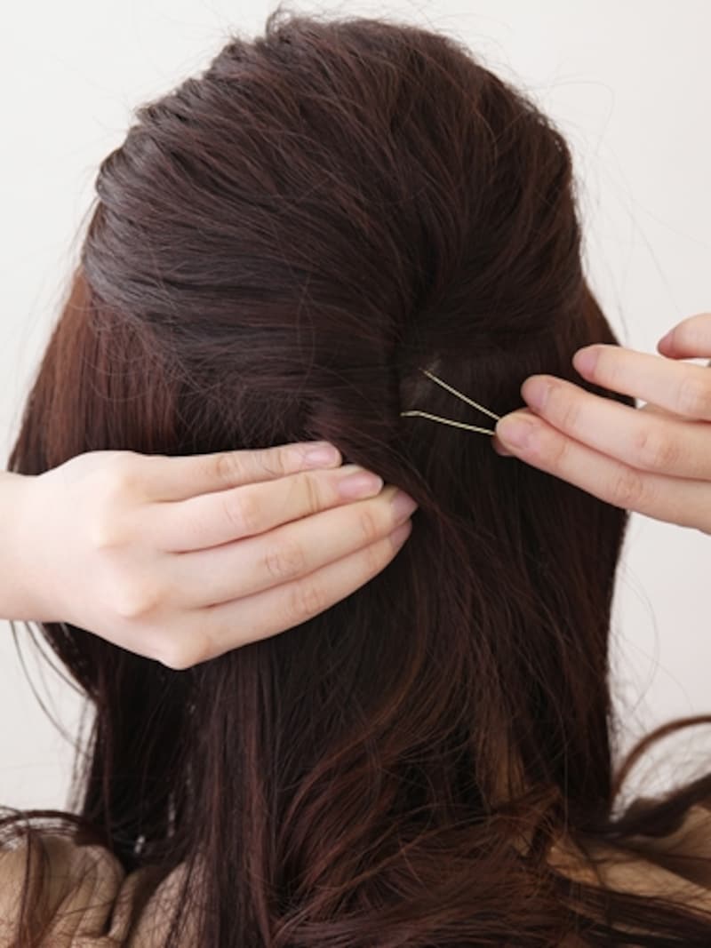 表からピンが見えないようにとめる