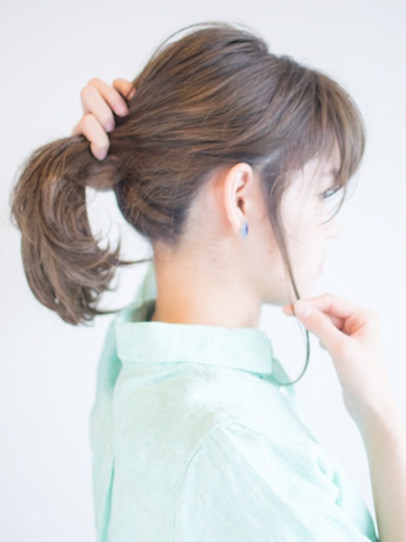 指先でつまみながら引き出す